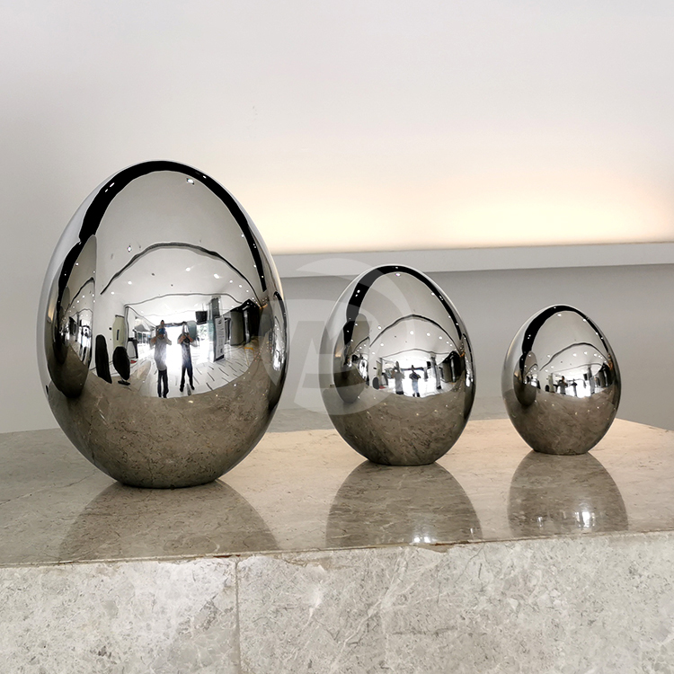 Stainless steel egg shaped sculpture 