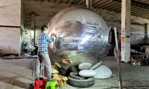 Polishing large stainless steel sphere